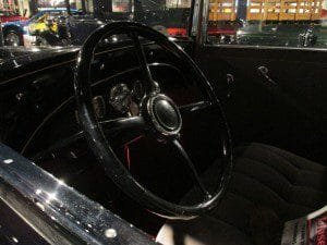 1930 Oldsmobile Deluxe front seat interior.